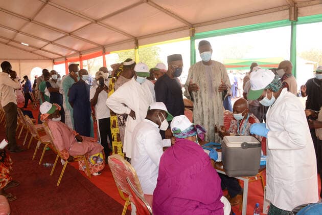 (210331) -- BAMAKO, March 31, 2021 -- People line up to register before receiving the COVID-19 vaccine in Bamako, Mali, on March 31, 2021. Malian Minister of Health and Social Development Fanta Siby received Wednesday her first dose of COVID-19 vaccine, which symbolized the official kickoff of Mali s COVID-19 vaccination campaign. During this first phase of the vaccination campaign, according to the minister, a total of 21,406 health workers will be vaccinated in Bamako, epicenter of the pandemic in this West African country. (Photo by Xinhua) MALI-BAMAKO-COVID-19-VACCINATION HabibxKouyate