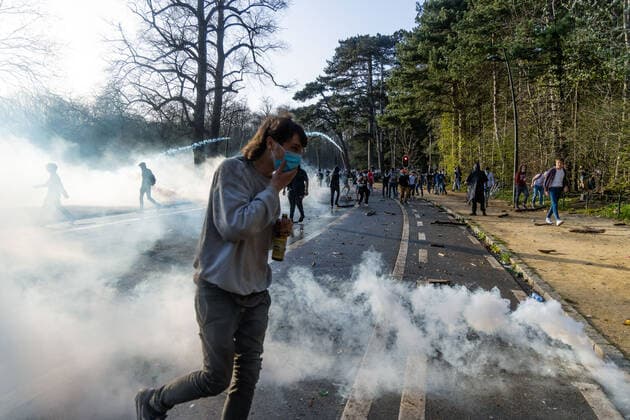 April 1, 2021, Brussels, Belgium: Protest against sanitary measures and wild party called La Boum in Brussels, social distancing was rarely respected and the wearing of masks also, a lot of tension and violence between police and demonstrators. Brussels Belgium - ZUMAb331 20210401_zaf_b331_037 Copyright: xArnaudxBrianx