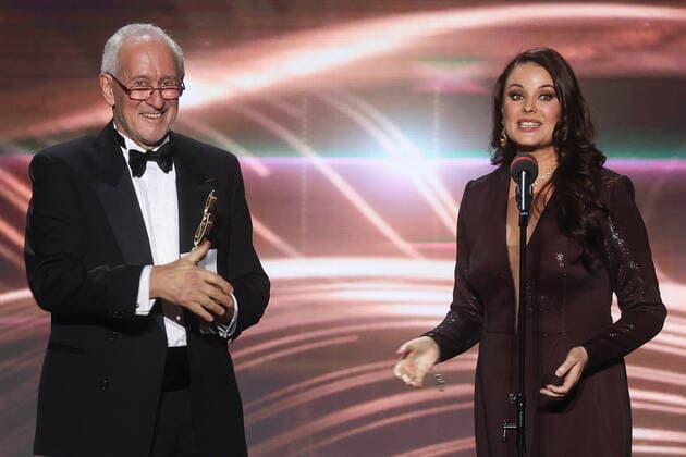 MOSCOW, RUSSIA â€“ APRIL 2, 2021: World Orchestra for Peace founder and director Charles Kay (L) and TV host Oksana Fyodorova at the 2021 BraVo music awards ceremony at the Bolshoi Theatre. BraVo is an international professional music award presented to artists for their contribution to classical art and popular music. This year, the award is presented for achievement in classical art in the past two years. Vyacheslav Prokofyev TASS  TS0FB61A