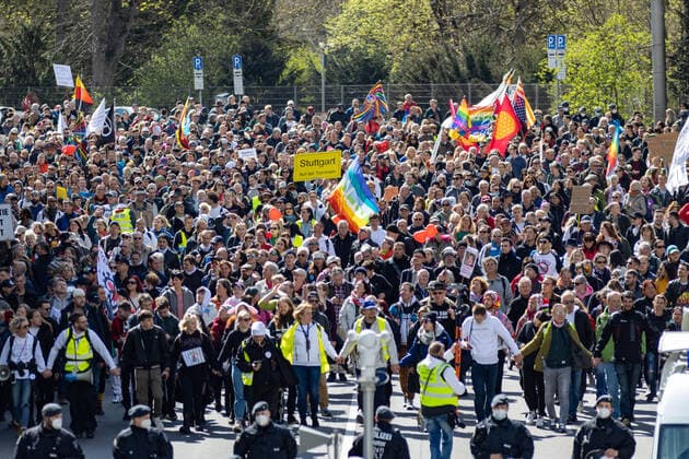 Demonstration of Querdenken 711 in Stuttgart 03 04 2021 Under the motto The year of freedom Basic rights are not negotiable supporters of the Querdenken movement demonstrate in Stuttgart Counter-demonstrators try to block the demonstrations on bicycles and on foot