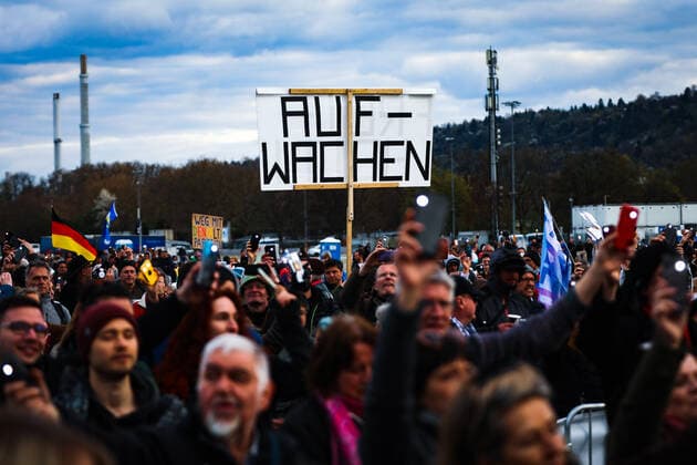 Demonstration against Corona requirements in Stuttgart 03 04 2021 Stuttgart Participants at a rally against the Corona requirements on the Cannstatter Wasen in Stuttgart On the sign is AUFWACHEN Kassel Hessen Germany