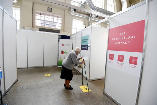 (210403) -- RIGA, April 3, 2021 -- A woman is seen at a mass immunization center in Riga, Latvia, on April 3, 2021. Latvia on Saturday opened mass immunization centers in eight cities and towns in a bid to ramp up vaccinations against COVID-19, health authorities informed. (Photo by Xinhua) LATVIA-RIGA-COVID-19-MASS IMMUNIZATION CENTER-OPENING EdijsxPalens 