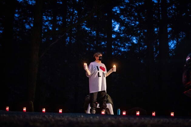 April 3, 2021, North Vancouver, BC, Canada: A volunteer holds candles during a drive-thru candlelight vigil for the victims of last week s mass stabbing incident in and around the Lynn Valley Library, at Lynn Canyon Park in North Vancouver, B.C., on Saturday, April 3, 2021. North Vancouver Canada  - ZUMAc35_ 20210403_zaf_c35_104 Copyright: xDarrylxDyckx