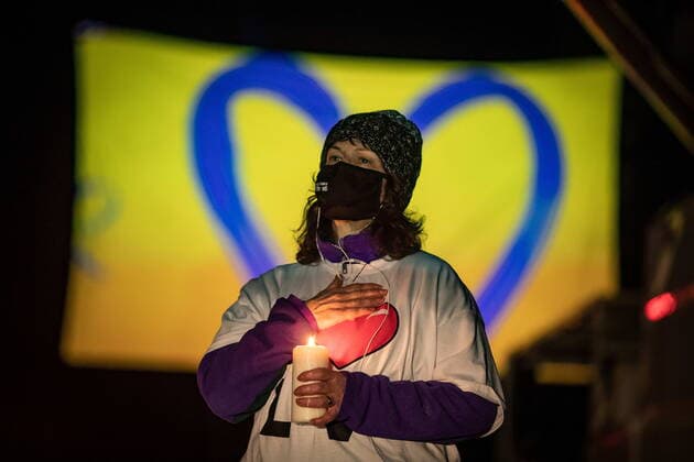 April 3, 2021, North Vancouver, BC, Canada: Pauline Sanderson holds a candle during a drive-thru candlelight vigil for the victims of last week s mass stabbing incident in and around the Lynn Valley Library, at Lynn Canyon Park in North Vancouver, B.C., on Saturday, April 3, 2021. North Vancouver Canada  - ZUMAc35_ 20210403_zaf_c35_106 Copyright: xDarrylxDyckx