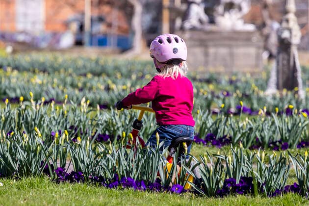 Toddler with running wheel 05 04 2021 DEU, Germany, Baden Württemberg, Stuttgart