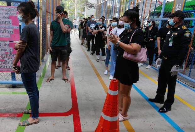 April 7, 2021, Bangkok, Thailand: People wait in a queue to get vaccinated with the CoronaVac (Sinovac) vaccine..Several cabinet ministers and all Bhumjaithai Party MPs have begun 14-day quarantine after being in close contact with new Covid-19 cases. Bangkok Thailand - ZUMAs197 20210407_zaa_s197_010 Copyright: xChaiwatxSubprasomx
