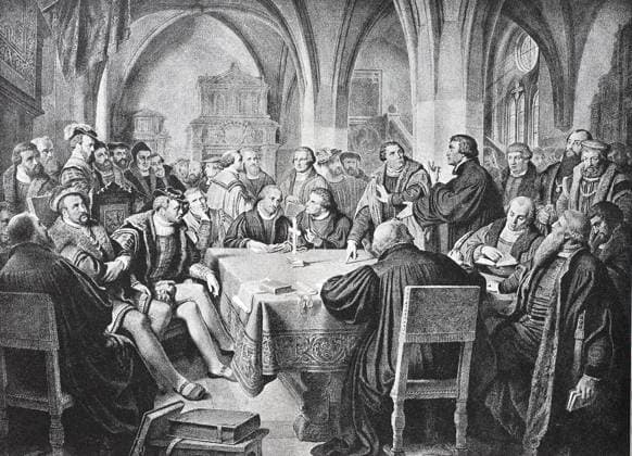 The Marburg Colloquy was a meeting at Marburg Castle, Marburg, Hesse, Germany, which attempted to solve a disputation between Martin Luther and Ulrich Zwingli over the Real Presence of Christ in the Eucharist. It took place between 1 October and 4 October 1529 Das Marburger Religionsgespräch 1529 war ein Teil der theologischen Auseinandersetzung zwischen dem lutherischen und reformierten Zweig der Reformation, Historisch, digital improved reproduction of an original from the 19th century digitale Reproduktion einer Originalvorlage aus dem 19. Jahrhundert 4922151