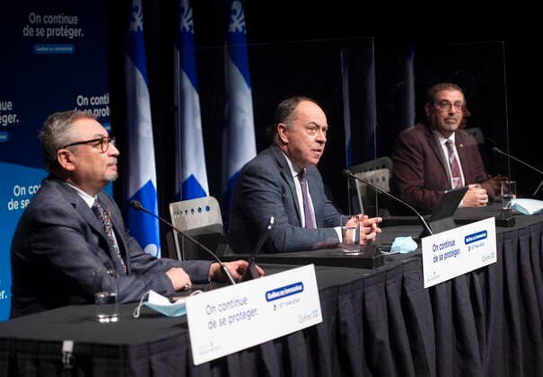 April 7, 2021, Montreal, PQ, Canada: Quebec s Public Health Director Horacio Arruda, left, Health Minister Christian Dube, center, and Director of Vaccinations Daniel Pare, right, speak to the media at the COVID-19 press briefing Wednesday, April 7, 2021 in Montreal. Montreal Canada - ZUMAc35_ 20210407_zaf_c35_006 Copyright: xRyanxRemiorzx