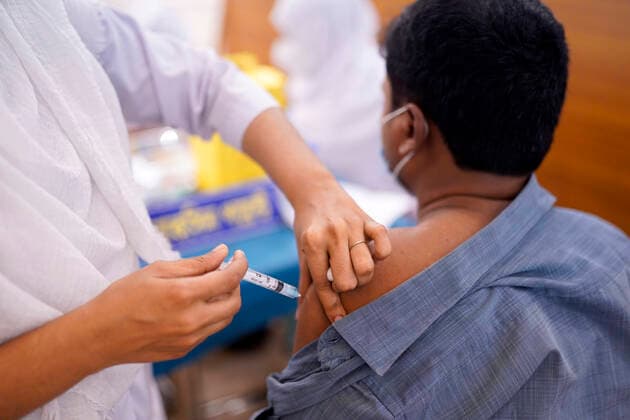 April 8, 2021, Dhaka, Bangladesh: A Bangladeshi citizen receives an Oxford-AstraZeneca vaccine during the second dose of coronavirus vaccination campaign at Bangabandhu Sheikh Mujib Medical University Dhaka Bangladesh - ZUMAs197 20210408_zaa_s197_032 Copyright: xSultanxMahmudxMukutx
