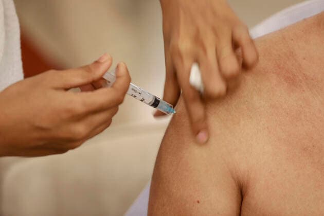 April 8, 2021, Dhaka, Bangladesh: A man receives a dose of Covid-19 coronavirus vaccine during second phase of Covid-19 vaccination drive at the Bangabandhu Sheikh Mujib Medical University (BSMMU) in Dhaka, Bangladesh, April 8, 2021. The government is supposed to get 5 million doses of the Oxford-AstraZeneca vaccine every month as per a deal between India s Serum Institute and Bangladeshi pharma company Beximco. The country has so far received two shipments of 7 million doses of the Covid-19 vaccine. Apart from this, Bangladesh received two consignments of 3.2 million doses of the vaccine as gifts from India. Dhaka Bangladesh - ZUMAd117 20210408_zap_d117_009 Copyright: xSuvraxKantixDasx