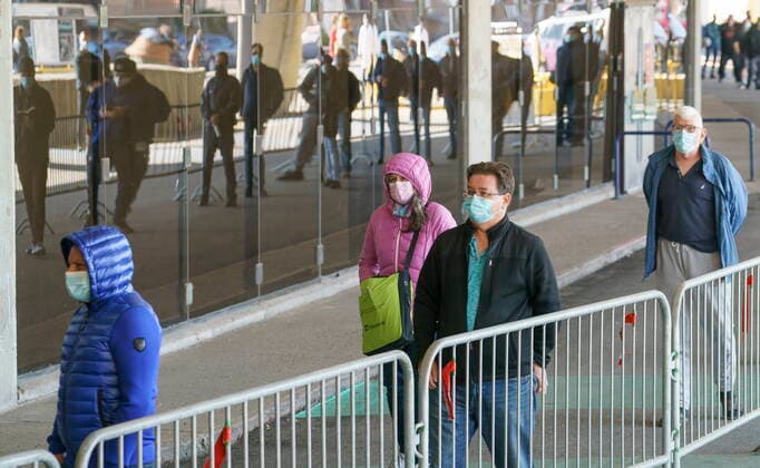 April 8, 2021, Montreal, PQ, Canada: People wait in line at a COVID-19 vaccination clinic to receive the AstraZeneca vaccine at Olympic Stadium in Montreal, on Thursday, April 8, 2021. Quebecers 55 and over can now get the AstraZeneca vaccine at walk-in clinics across the province. Montreal Canada  - ZUMAc35_ 20210408_zaf_c35_014 Copyright: xPaulxChiassonx