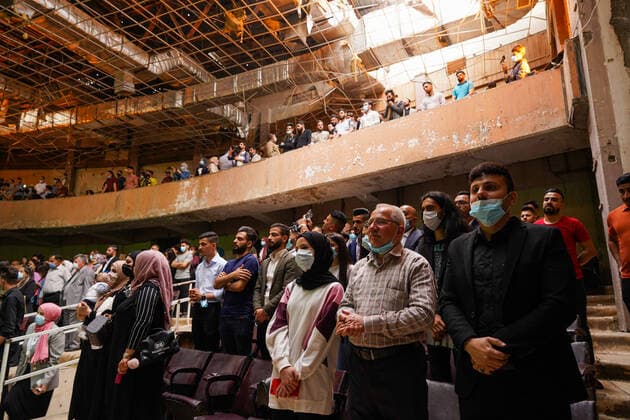 April 8, 2021, Mosul, Nineveh, Iraq: The audience during a performance by the Watar orchestral, playing for the first time on the grounds of the Spring Theatre Hall, which was destroyed during the ISIS occupation in the city..The Watar orchestral includes 36 young men and women from different denominations of Nineveh Governorate, including Muslims, Christians and Yazidis, whose ages range between 8-32 years. Mosul Iraq - ZUMAs197 20210408_zaa_s197_178 Copyright: xIsmaelxAdnanx