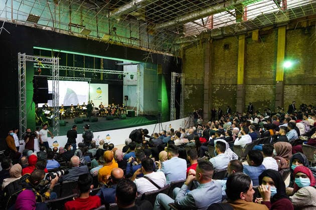 April 8, 2021, Mosul, Nineveh, Iraq: The audience during a performance by the Watar orchestral, playing for the first time on the grounds of the Spring Theatre Hall, which was destroyed during the ISIS occupation in the city..The Watar orchestral includes 36 young men and women from different denominations of Nineveh Governorate, including Muslims, Christians and Yazidis, whose ages range between 8-32 years. Mosul Iraq - ZUMAs197 20210408_zaa_s197_172 Copyright: xIsmaelxAdnanx