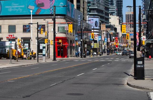(210408) -- TORONTO, April 8, 2021 -- Photo taken on April 8, 2021 shows a street in downtown Toronto, Ontario, Canada. As COVID-19 cases rise due to more transmissible variants spreading across Canada, populous provinces in the country are reinstating public health restrictions to stem the pandemic. Ontario province imposed a provincewide stay-at-home order that went into effect at 12:01 a.m. Thursday and lasts 28 days. (Photo by Xinhua) CANADA-ONTARIO-COVID-19-STAY-AT-HOME ORDER ZouxZheng 