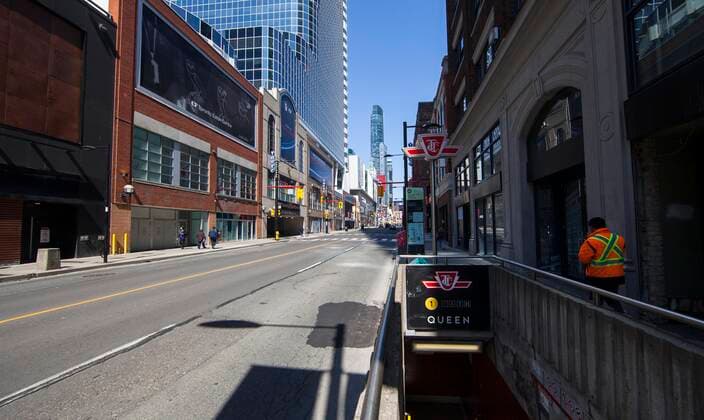 (210408) -- TORONTO, April 8, 2021 -- Photo taken on April 8, 2021 shows a street in downtown Toronto, Ontario, Canada. As COVID-19 cases rise due to more transmissible variants spreading across Canada, populous provinces in the country are reinstating public health restrictions to stem the pandemic. Ontario province imposed a provincewide stay-at-home order that went into effect at 12:01 a.m. Thursday and lasts 28 days. (Photo by Xinhua) CANADA-ONTARIO-COVID-19-STAY-AT-HOME ORDER ZouxZheng 