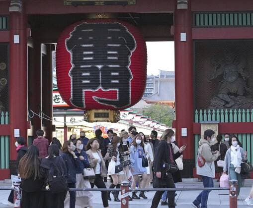 Japan s fight against novel coronavirus People wearing masks to protect against the novel coronavirus walk in Tokyo s Asakusa area on April 10, 2021. 