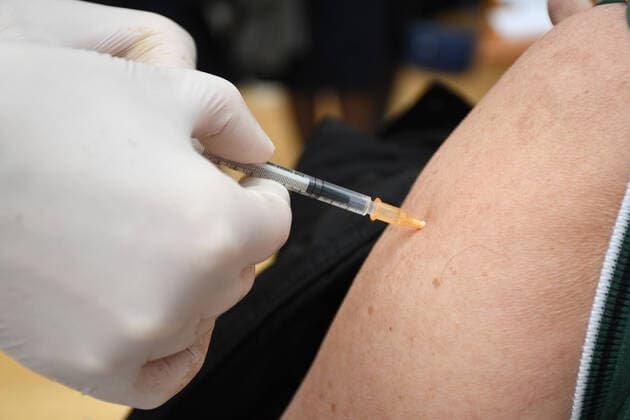 CROATIA COVID-19 mass vaccination A woman receives the Pfizer-BioNTech Comirnaty coronavirus disease (COVID-19) vaccine during a mass vaccination at Koprivnica sports hall in Koprivnica, Croatia on April 10, 2021. DamirxSpehar PIXSELL