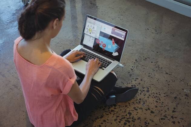 Graphic designer working on laptop while sitting at floor High angle view of graphic designer working on laptop while sitting at office floor, model released, , property released, Cape Town, South Africa, 04.03.2017, 973610.jpg, graphic designer, working, laptop, sitting, office, flooring, businesswoman, well dressed, smart, elegant, classy, stylish, profession, professional, professional occupation, corporate, workplace, using, typing, notebook, technology, computer, wireless, editor, job, career, agency, company, creative, business, editing, design, designing, graphic, artist, creativity, occupation, designer, cool, style, hip, design professional Indoors,High angle view,Day,Full length