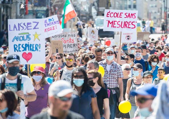 April 10, 2021, Montreal, PQ, Canada: People take part in a demonstration in Montreal, Saturday, April 10, 2021, opposing the Quebec governmentÃ¢â‚¬â ¢s health and safety measures to curb the spread of Covid-19 in schools as the COVID-19 pandemic continues in Canada and around the world. Montreal Canada  - ZUMAc35_ 20210410_zaf_c35_015 Copyright: xGrahamxHughesx