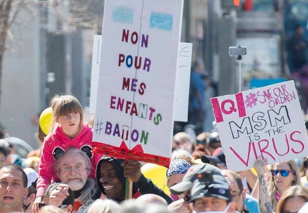 April 10, 2021, Montreal, PQ, Canada: People take part in a demonstration in Montreal, Saturday, April 10, 2021, opposing the Quebec governmentÃ¢â‚¬â ¢s health and safety measures to curb the spread of Covid-19 in schools as the COVID-19 pandemic continues in Canada and around the world. Montreal Canada  - ZUMAc35_ 20210410_zaf_c35_018 Copyright: xGrahamxHughesx