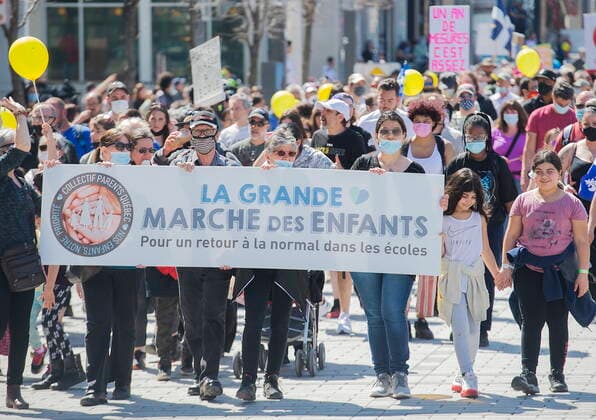 April 10, 2021, Montreal, PQ, Canada: People take part in a demonstration in Montreal, Saturday, April 10, 2021, opposing the Quebec governmentÃ¢â‚¬â ¢s health and safety measures to curb the spread of Covid-19 in schools as the COVID-19 pandemic continues in Canada and around the world. Montreal Canada  - ZUMAc35_ 20210410_zaf_c35_019 Copyright: xGrahamxHughesx