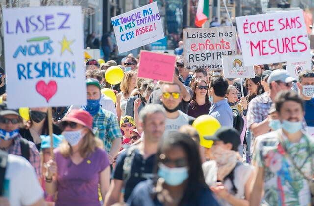 April 10, 2021, Montreal, PQ, Canada: People take part in a demonstration in Montreal, Saturday, April 10, 2021, opposing the Quebec governmentÃ¢â‚¬â ¢s health and safety measures to curb the spread of Covid-19 in schools as the COVID-19 pandemic continues in Canada and around the world. Montreal Canada  - ZUMAc35_ 20210410_zaf_c35_020 Copyright: xGrahamxHughesx