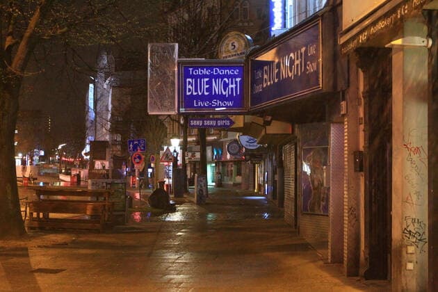 Empty street amusement mile Reeperbahn on St Pauli after the beginning of the curfew at 21 oclock Altona Hamburg