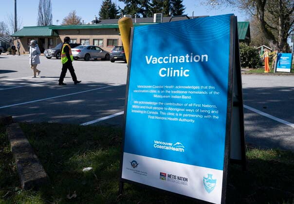 April 10, 2021, Richmond, BC, Canada: A sign indicating a COVID-19 vaccination clinic run by Vancouver Coastal Health is seen, in Richmond, B.C., Saturday, April 10, 2021. Richmond Canada  - ZUMAc35_ 20210410_zaf_c35_036 Copyright: xJonathanxHaywardx