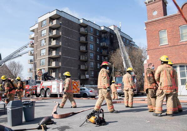 April 11, 2021, Montreal, PQ, Canada: Firefighters are shown at the scene of a fire at an apartment building in Montreal, Sunday, April 11, 2021. Montreal Canada  - ZUMAc35_ 20210411_zaf_c35_012 Copyright: xGrahamxHughesx