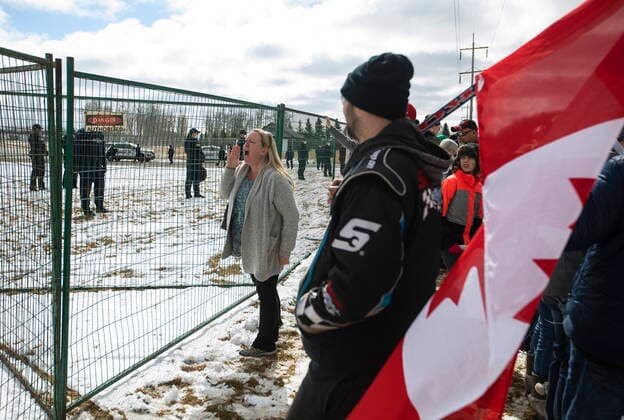 April 11, 2021, EDMONTON, ab, Canada: Supporters gather outside GraceLife Church near Edmonton, Alta., on Sunday, April 11, 2021. The church has been fenced off by police and Alberta Health Services in violation of COVID-19 rules. EDMONTON Canada  - ZUMAc35_ 20210411_zaf_c35_037 Copyright: xJasonxFransonx