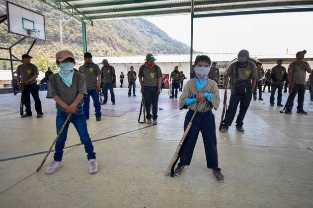 A picture taken from several minors during their presentation and integration to the community police in the municipality of Jose Joaquin Herrera, state of Guerrero, Mexico, 11 April 2021. A group of approximately 30 children between 6 and 11 years old joined the community police on Saturday in the municipality of Jose Joaquin de Herrera, in the Low Mountain of the southern Mexican state of Guerrero. The children, belonging to the town of Ayahualtempa, also held a march through the main streets of their community, in the company of another group of children who had joined the police group in January 2020. 30 children between 6 and 11 years old were integrated into community policing in Mexico !ACHTUNG: NUR REDAKTIONELLE NUTZUNG!  Copyright: xDavidxGuzmanx MEX9421 20210411-637537823851750148