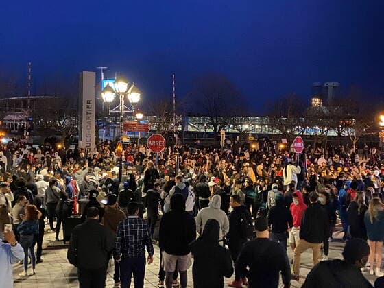 April 11, 2021, Montreal, PQ, Canada: People take part in an anti-curfew protest in Montreal on Sunday April 11, 2021. Hundreds of people gathered in Old Montreal tonight in defiance of a new 8 p.m. curfew. Montreal Canada  - ZUMAc35_ 20210411_zaf_c35_070 Copyright: xGiuseppexValiantex