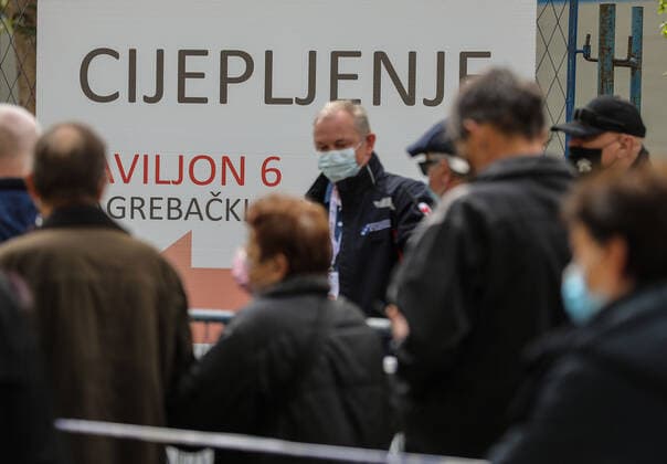 PXL_Mass vaccination in Zagreb People queue outside Zagreb Fair hall during a mass vaccination at Zagreb Fair hall in Zagreb,Croatia on April 12, 2021.By the end of the day 5,000 citizens should receive the AstraZeneca COVID-19 vaccine JuricaxGaloic PIXSELL