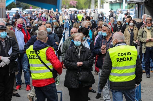 PXL_Mass vaccination in Zagreb People queue outside Zagreb Fair hall during a mass vaccination at Zagreb Fair hall in Zagreb,Croatia on April 12, 2021.By the end of the day 5,000 citizens should receive the AstraZeneca COVID-19 vaccine JuricaxGaloic PIXSELL