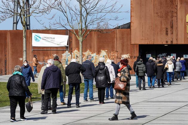 Dortmunjd, 12 04 2021 Queue in front of the Corona Vaccination Centre in the Warsteiner Music Hall on the site of the former Hoesch blast furnace plant Phoenix West in the Dortmund district of Hörde The vaccinations are carried out here by the Kassenärztliche Vereinigung Westfalen Lippe KVWL