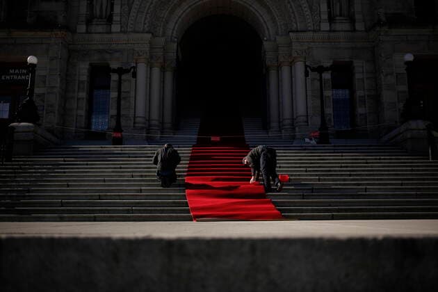 April 12, 2021, Victoria, BC, Canada: Legislative staff roll out the red carpet before the arrival of Lt.- Gov. Janet Austin to the B.C. Legislature to deliver the prorogation address in the chamber ahead of the throne speech in Victoria, B.C., on Monday, April 12, 2021. Victoria Canada  - ZUMAc35_ 20210412_zaf_c35_010 Copyright: xChadxHipolitox