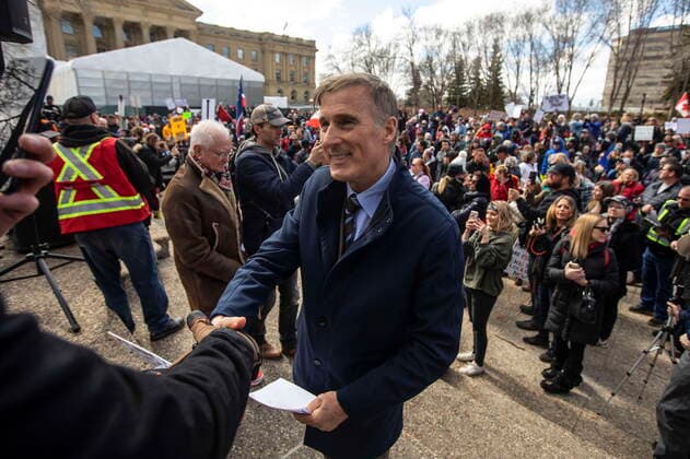 April 12, 2021, EDMONTON, ab, Canada: People s Party leader Max Bernier takes part in an anti-lockdown and anti-mask protest at the Alberta Legislature in Edmonton on Monday April 12, 2021. EDMONTON Canada  - ZUMAc35_ 20210412_zaf_c35_041 Copyright: xJasonxFransonx