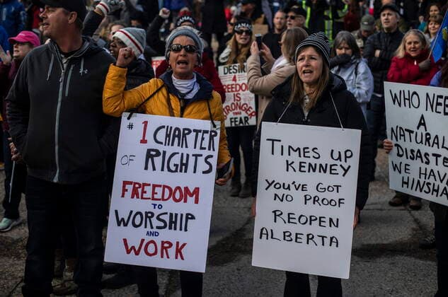 April 12, 2021, EDMONTON, ab, Canada: Anti-lockdown and anti-mask protesters take part in a rally outside the Alberta Legislature in Edmonton on Monday, April 12, 2021. EDMONTON Canada  - ZUMAc35_ 20210412_zaf_c35_044 Copyright: xJasonxFransonx