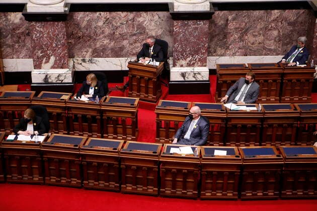 April 12, 2021, Victoria, BC, Canada: Members of the opposition look on as Lt.- Gov. Janet Austin delivers the throne speech at Legislature in Victoria, B.C., on Monday, April 12, 2021. Victoria Canada  - ZUMAc35_ 20210412_zaf_c35_068 Copyright: xChadxHipolitox