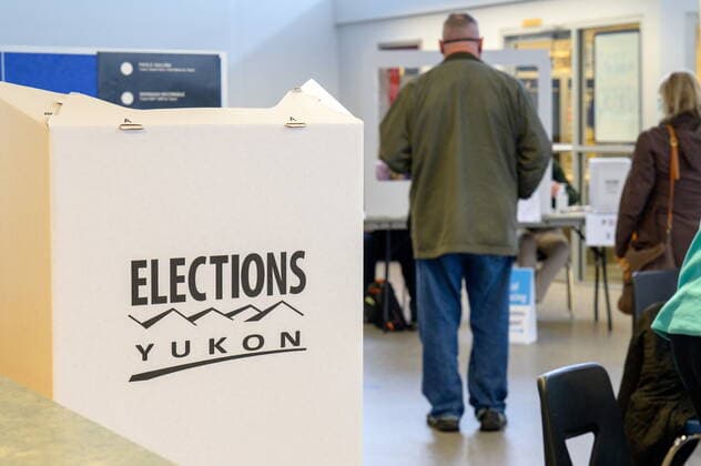 April 12, 2021: Voters and poll workers are shown at a Whitehorse polling station during the Yukon election on Monday April 12, 2021. Polls have closed across Yukon and votes are being counted as three main parties vie to form the territory s next government.  - ZUMAc35_ 20210412_zaf_c35_108 Copyright: xMarkxKellyx