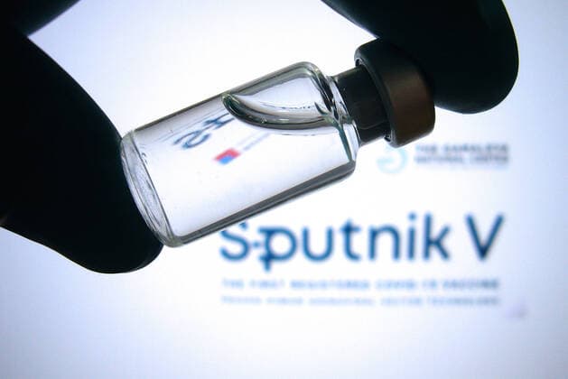 Theme image ,Symbol photo Sputnik V vaccine Vaccine can with vaccine