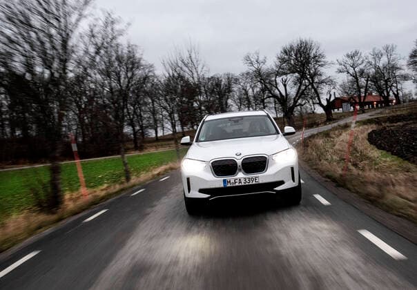 BMW iX3 Charged driving on the road. STOCKHOLM SWEDEN x10050x *** BMW iX3 Charged driving on the road STOCKHOLM SWEDEN x10050x,  Copyright: xPontusxLundahl TTx BMW IX3 CHARGED