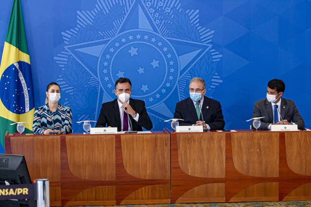 Press Conference on confronting the pandemic with Brazilian Minister of Health. April 14, 2021, Brasilia, Federal District, Brazil: Right after the meeting of the National Coordination Committee for Confronting the Pandemic, the Minister of Health, Marcelo Queiroga, together with Senate President Rodrigo Pacheco and representing the Chamber of Deputies doctor and federal deputy Dr. Luizinho and Francieli Fantinato, who is the coordinator of the National Immunization Program granting a press conference in the West Hall of the Planalto Palace.  Copyright: xLecoxVianax