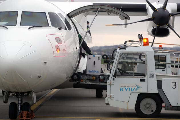 KYIV, UKRAINE - APRIL 16, 2021 - A container with the Pfizer?BioNTech COVID-19 vaccine (Comirnaty) is being reloaded from a plane at Kyiv International Airport, Kyiv, capital of Ukraine. The first batch of the Pfizer?BioNTech vaccine that contains 117,000 doses is intended for the residents of care homes and the employees of the State Emergency Service and the State Border Guard Service. Ukraine gets first batch of Pfizer vaccine  Copyright: xPavlo_Bagmutx