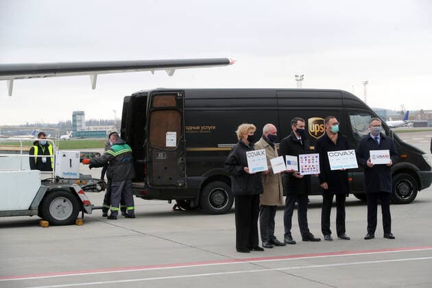 KYIV, UKRAINE - APRIL 16, 2021 - UNICEF Representative in Ukraine Lotta Sylwander (L), Deputy Minister of Health, Chief Sanitary Doctor of Ukraine Viktor Liashko (C) and WHO Representative Head of Country Office Dr Jarno Habicht (2nd R) are seen on the tarmac to welcome the arrival of the first batch of the Pfizer?BioNTech COVID-19 vaccine (Comirnaty) at Kyiv International Airport, Kyiv, capital of Ukraine. The first batch of the Pfizer?BioNTech vaccine that contains 117,000 doses is intended for the residents of care homes and the employees of the State Emergency Service and the State Border Guard Service. Ukraine gets first batch of Pfizer vaccine  Copyright: xPavlo_Bagmutx