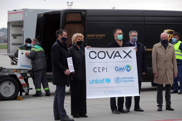KYIV, UKRAINE - APRIL 16, 2021 - Deputy Minister of Health, Chief Sanitary Doctor of Ukraine Viktor Liashko, UNICEF Representative in Ukraine Lotta Sylwander and WHO Representative Head of Country Office Dr Jarno Habicht (L to R) are seen on the tarmac to welcome the arrival of the first batch of the Pfizer?BioNTech COVID-19 vaccine (Comirnaty) at Kyiv International Airport, Kyiv, capital of Ukraine. The first batch of the Pfizer?BioNTech vaccine that contains 117,000 doses is intended for the residents of care homes and the employees of the State Emergency Service and the State Border Guard Service. Ukraine gets first batch of Pfizer vaccine  Copyright: xPavlo_Bagmutx