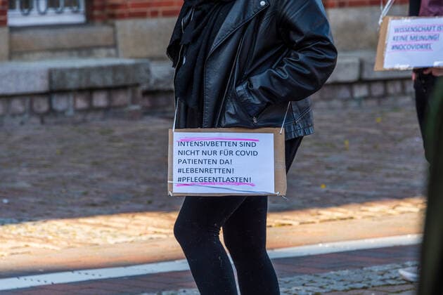 Kiel, 16 April 2021 On the town hall square in Kiel there was today on 16 April under the motto NoCovid it is possible a demonstration for stricter measures to fight the Corona pandemic The number of participants was limited to 100, all adhered to mask obligation and distance rules