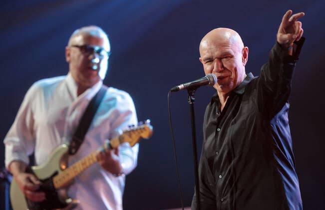 KRASNOGORSK, MOSCOW REGION, RUSSIA - APRIL 16, 2021: Guitarist Nikolai Devlet-Kildeyev (L) and lead singer Sergei Mazayev of the Russian rock band Moral Codex perform during a concert marking the band s 30th birthday at Crocus City Hall. Sergei Bobylev TASS  TS0FD081