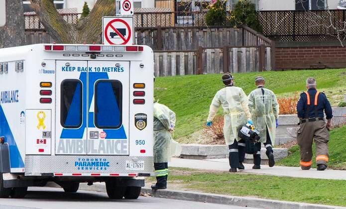 (210416) -- TORONTO, April 16, 2021 -- Paramedics wearing protective gears are on duty in Toronto, Canada, on April 16, 2021. On Friday afternoon, Canada reported 6,771 new cases of the COVID-19, bringing the cumulative total to 1,103,441, including 23,535 deaths, according to CTV. (Photo by Xinhua) CANADA-TORONTO-COVID-19-CASES ZouxZheng