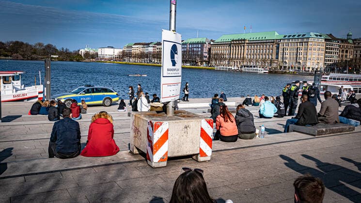 Hamburg Spring at the Binnenalster Alster The police it is too crowded, a DJ plays forbidden and many wear no mouth nose mask Hamburg